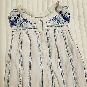 white tank top with blue design